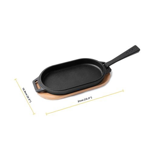Ooni - Piastra liscia ovale con manico in ghisa e supporto in legno 31 cm